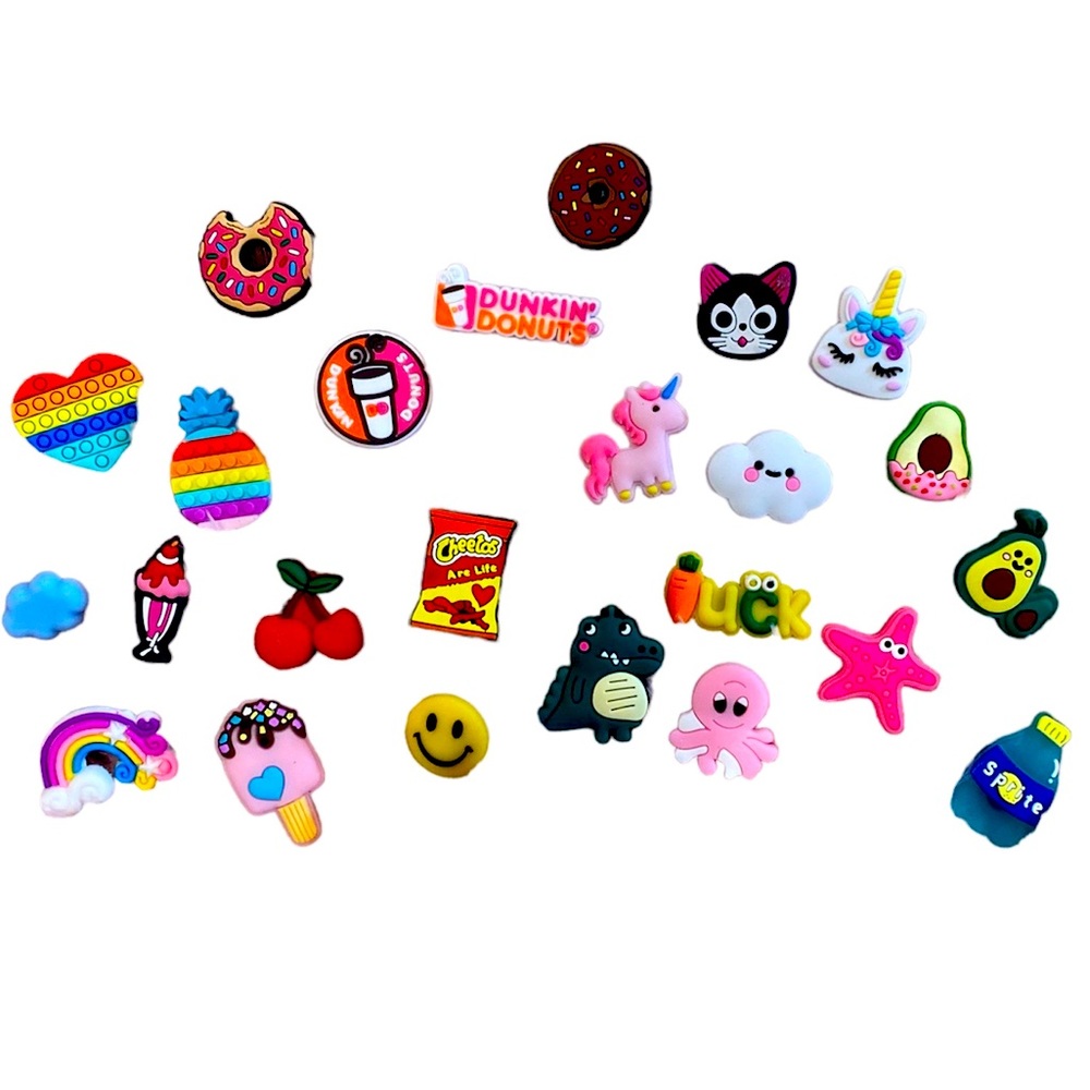 Set of (24) brand new croc charms!